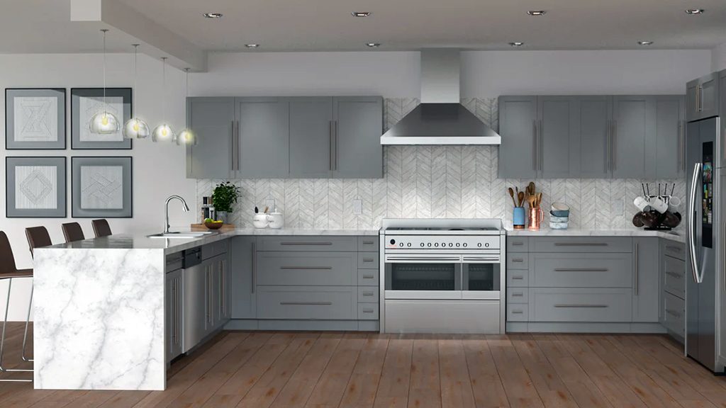 Gray shaker kitchen cabinets with marble countertop