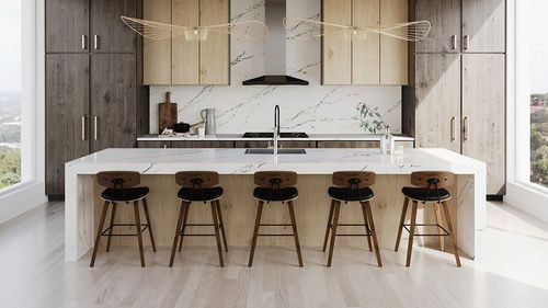 Wood and quartz kitchen with waterfall island