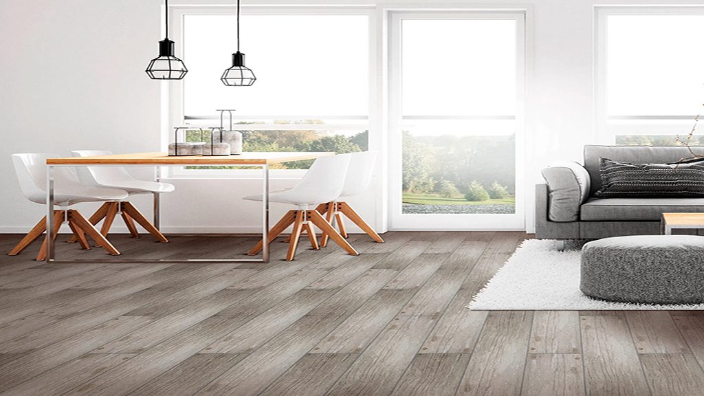 Gray wood-look vinyl plank in a dining area