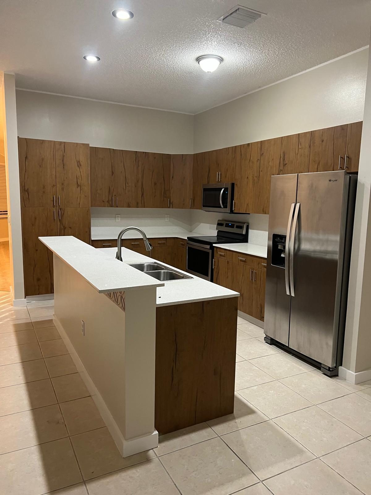 Kitchen remodel with new cabinets by J&L